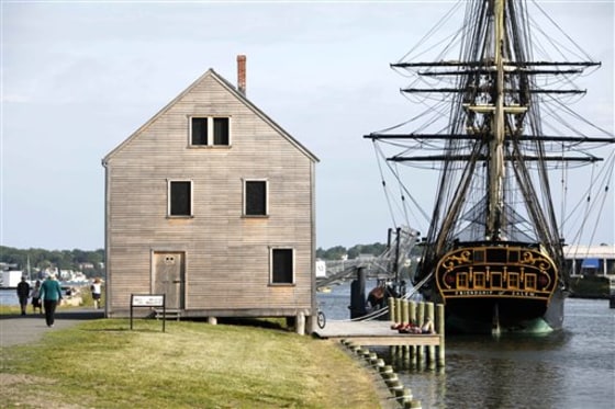 The tall ship Friendship of Salem is docked Friday in the harbor of Salem, Mass. Salem, home to the infamous witch trials of the 17th century, sees its ties to witchcraft as a blessing and a curse.